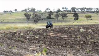 New Holland Tractor TM 115 scarifying/harrow paddock, Queensland, Australia