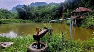 water Powered Pounder corn mill live