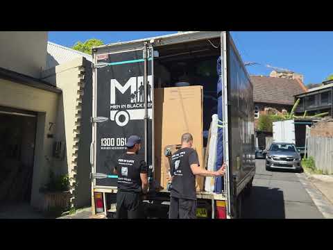 Men In Black Removals packing and loading furniture