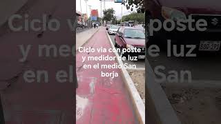 ciclo via con poste y medidor de luz enbel medio San borja