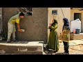 The moment the wall was completed with the efforts of Afsaneh and Yousef