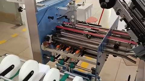 KMD 660T 6 buckles+4 tail buckles pharmaceutical leaflet folding machine.