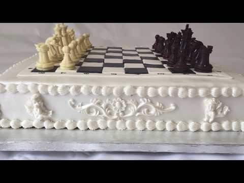 Classic Chess Board Cake with Edible Chocolate Pieces.