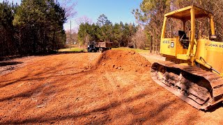 John Deere 450G Hay Barn Pad and Hillside Grading