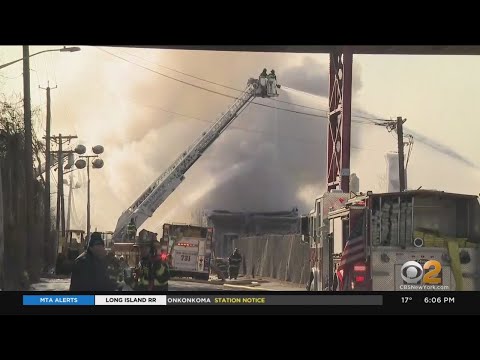 Firefighters Continue Battling Blaze At Passaic Warehouse