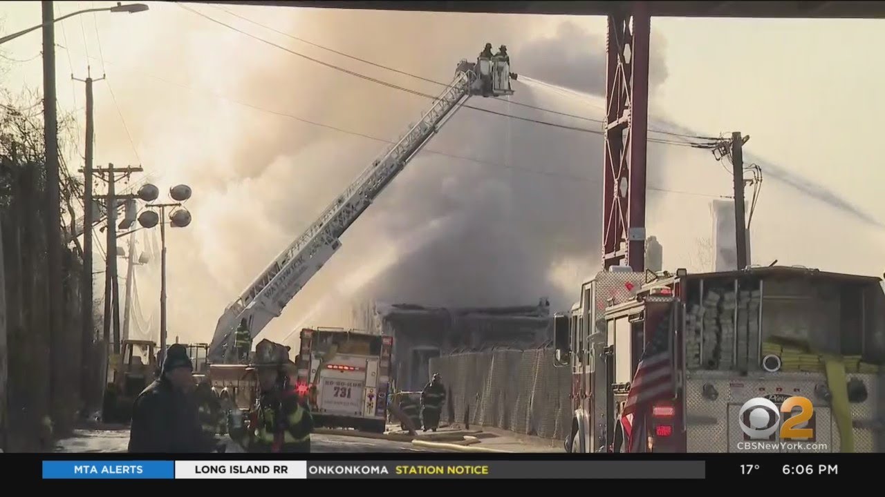 Firefighters Continue Battling Blaze At Passaic Warehouse - YouTube