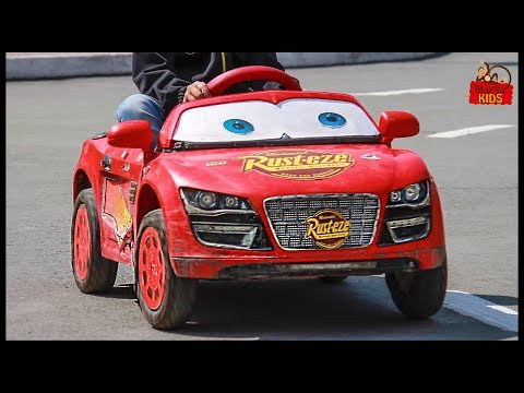 Lightning McQueen car and kids in children car park