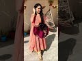 Aina asif in brown dress