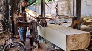 Watch an extra-thick teak beam being cut with extreme precision