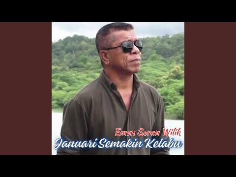 Putar Januari Semakin Kelabu - Emen Seran Wilik