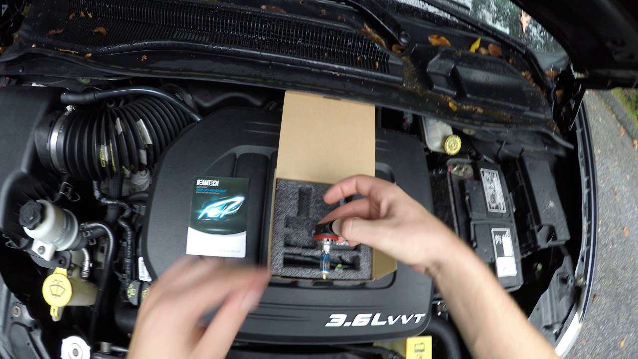 2009 chrysler town and country headlight bulb replacement