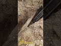 Hard clay soil digs with hammer