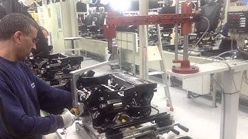 BA...RPC posi control arms in motion on car seats assembly line