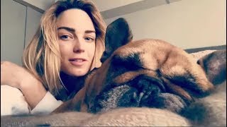 Caity Lotz Playing With Her Dogs