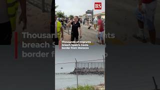 Watch: Thousands of migrants breach Spain's Ceuta border from Morocco