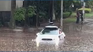 Waymo vehicle gets stuck in Atlanta floodwaters during heavy rain