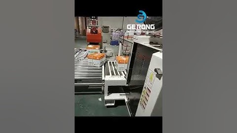 A4 paper sheet carton box PP strap sealing packing machine with robot hand palletizing machine
