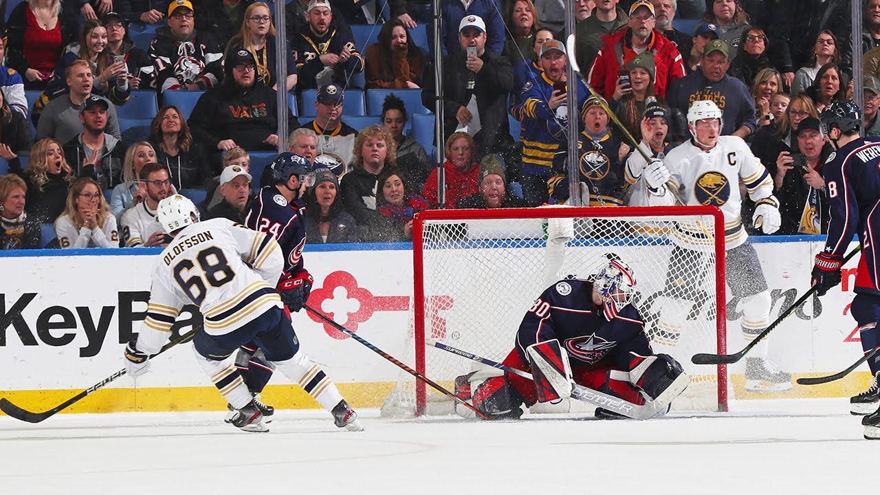 Buffalo Sabres forward Jack Eichel makes a beautiful pass to Victor Olofsso...