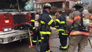 Firefighters battle house fire in Grand Rapids