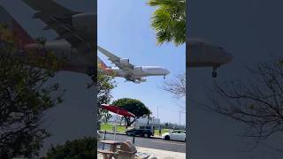 On The Sidewalk Close To The Lax Landing Strip.