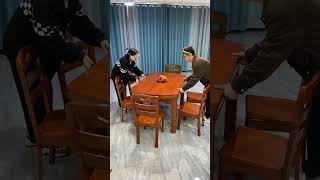 This is a modern wooden round dining table and chair set