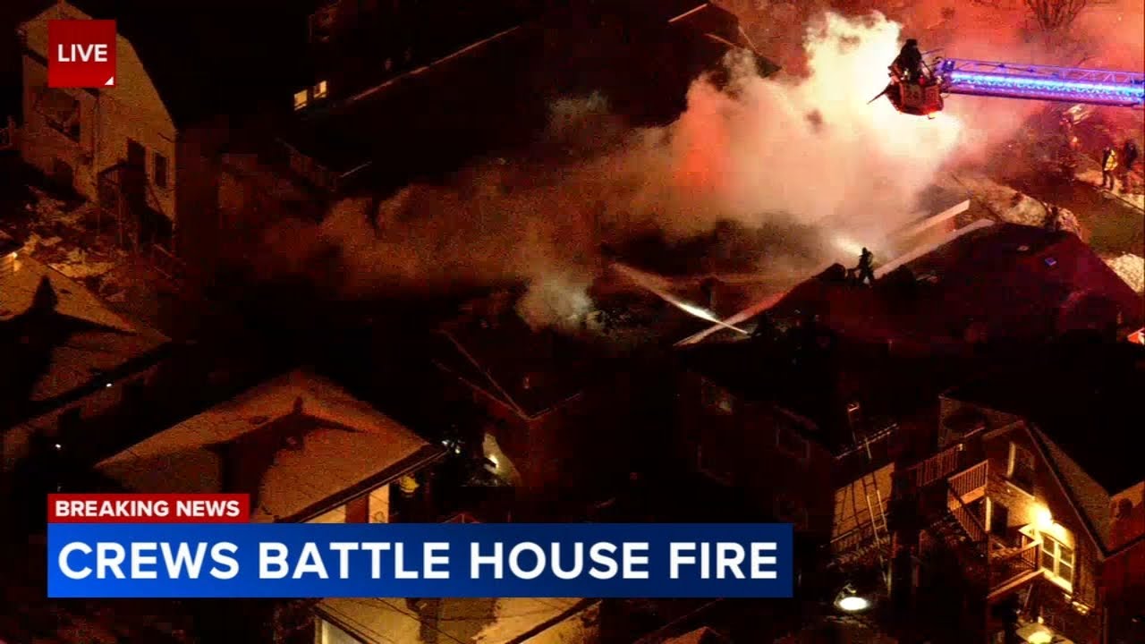 Chicago firefighters battle large house fire on South Side - YouTube