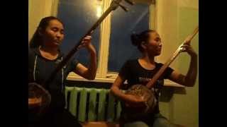 Two Mongolian girls playing the shanz