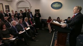 White House vows to appeal ruling blocking travel ban