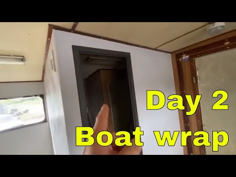Working on wrapping a work boat using the Architectural Films - Day 2 in Louisiana