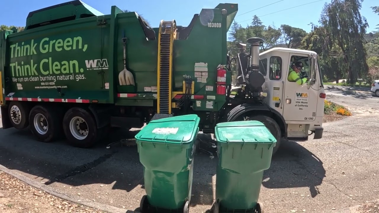A McNeilus ZR Collecting My 2 Yard waste bins!