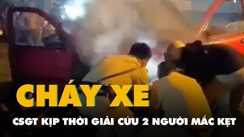 Video cảnh sát giao thông Tây Ninh cứu 2 người trong ô tô đang cháy nghi ngút