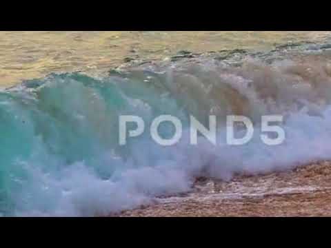Sea Waves At Dawn Pick Up Sand - Stock Footage