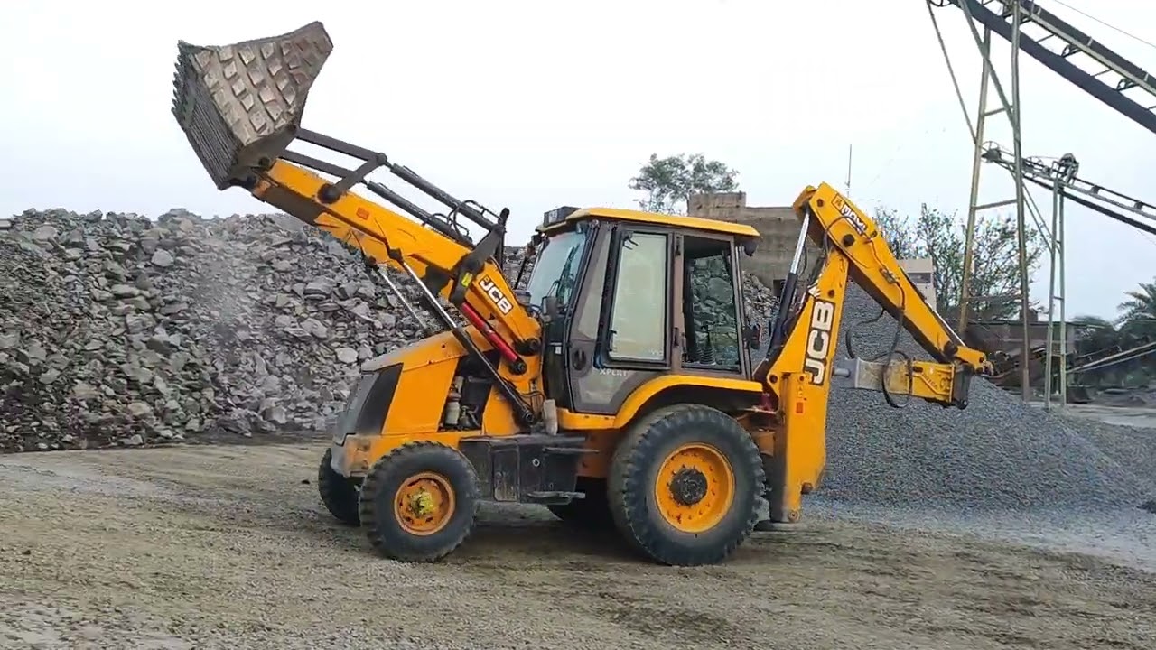 Jcb 3dx ecomax xpert machine stone Boulder loading video.