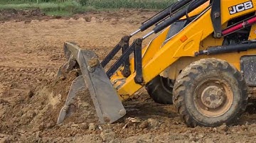 Jcb Backhoe machine pushing soil and leveling land @roadtrendmachinework