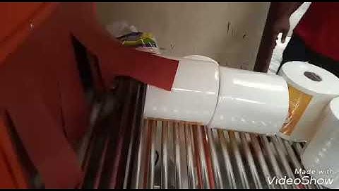 Automatic label application maxi roll paper packing machine