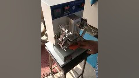 Logo Embossing and Numbering Machine.