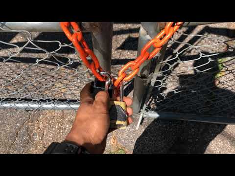 How to Chain Lock a Fence With Two Different Locks & Keys