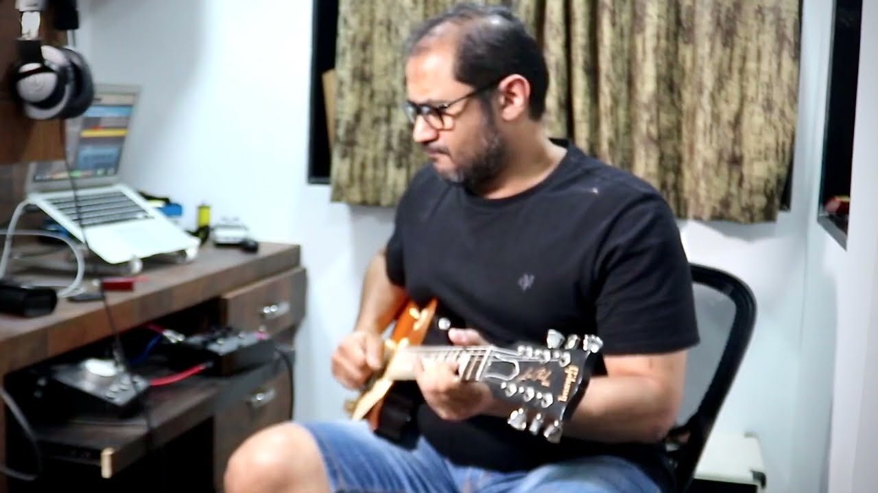 Blues & Indian Raga phrases together on a guitar jam.... psychedelic 