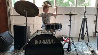 5 year old playing drums for the first time.