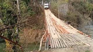 Wooden hanging bridge, connecting Kiphire and Pungro.