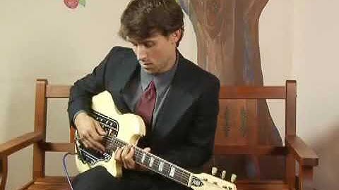 1st Inversion Octave Up of D Minor Guitar Chord on the Bottom Strings