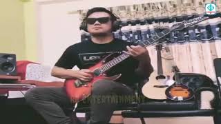 Guitarist Sanjeev Baraili Playing Guitar.