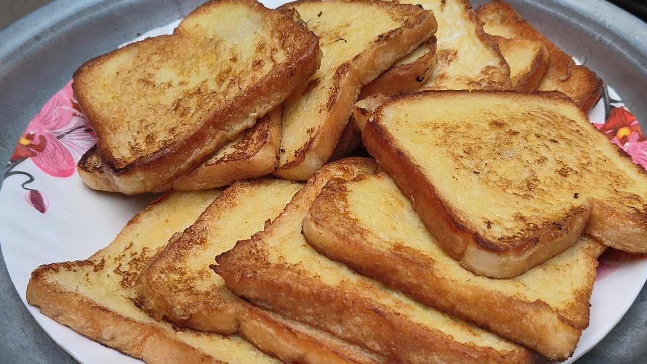 খুব সহজ একটি রেসিপি সকাল অথবা বিকালে এভাবে পাউরুটি ভেজে খাবেন দেখবেন অনেক মজা হয়েছে 