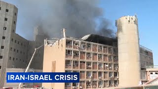 Israel threatens Iran's top leader after missiles damage hospital and wound more than 200