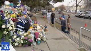 Makeshift memorial set up on fallen Boulder Police Officer Eric Talley's police cruiser