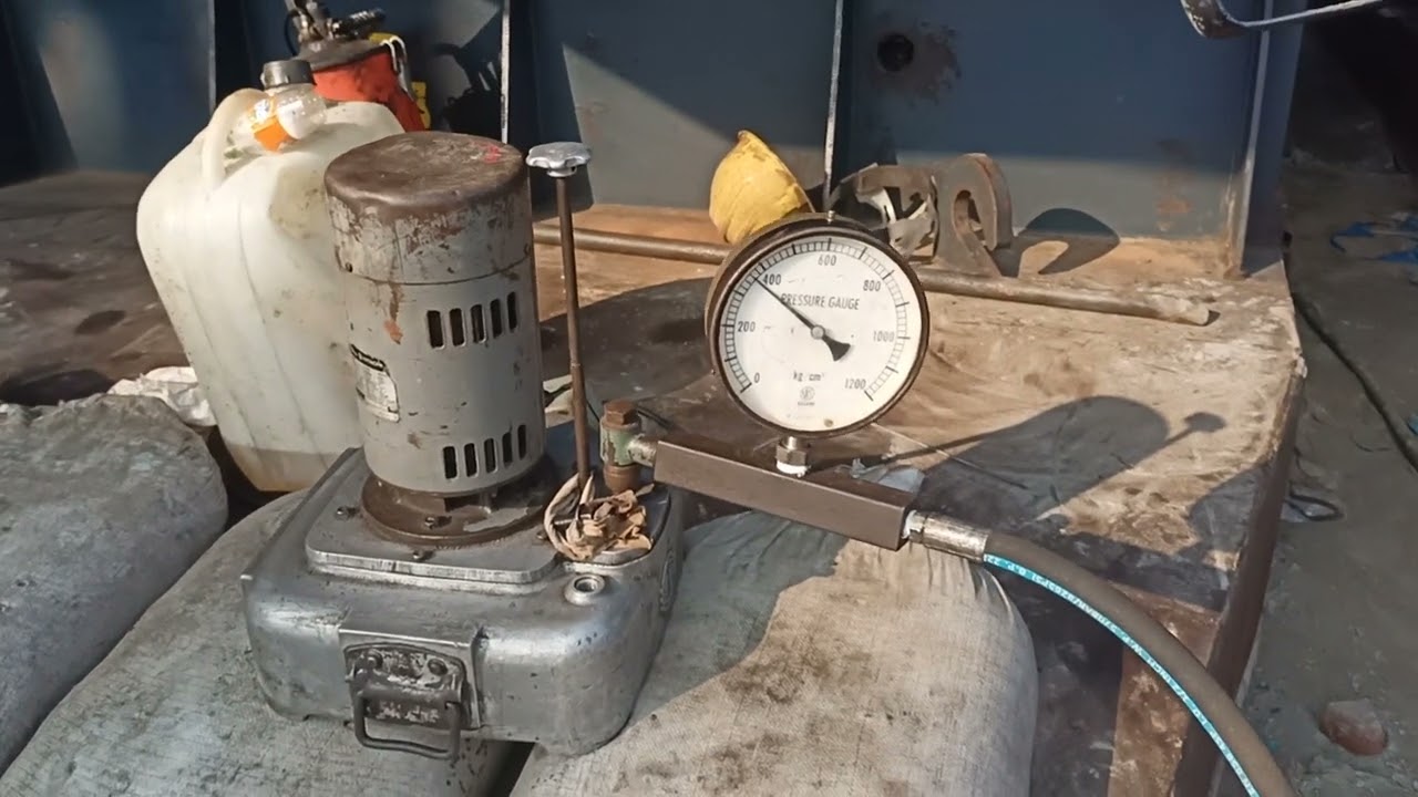 Static load testing of pre-cast pile by applying load of hydraulic static pile driver machine.