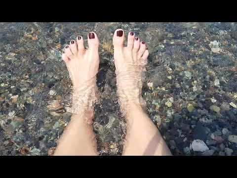 barefoot relaxation and meditation in the morning sun and sea waves