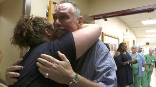Heart attack survivor hugs doctors who kept him alive