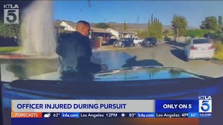 Officer appears to be struck by LAPD cruiser