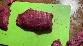 How to properly cut steak or jerky. Cross grain verses with grain slicing.
